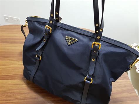 prada dark blue handbag|blue Prada nylon bag.